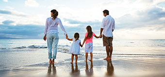Family walking on Ponte Vedra Beach