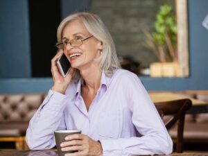 Senior lady calling Red Door Realty Group about new construction - Northeast Florida buyer rebate program